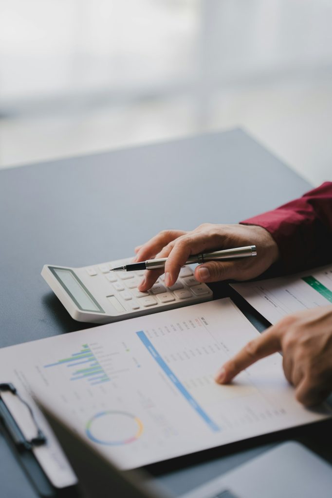 Portrait of man working on tablet computer in modern office make account analysis report Real estate
