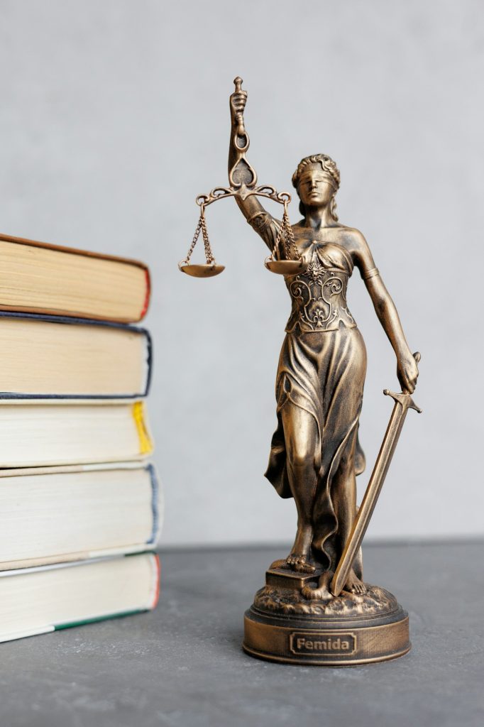 themis goddess of justice statuette, symbol of law with scales and sword in his hands